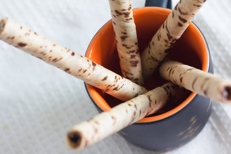 Wafer rolls sticks on cup
