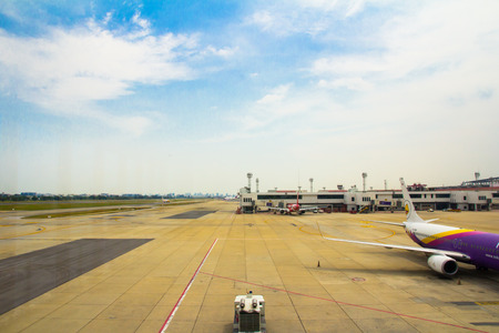 BANGKOK, THAILAND - MAR 24, 2017: airplane parked at Don Mueang International Airport in Bangkok, Thailand.のeditorial素材