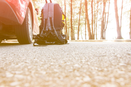 bag backpack on the roadの写真素材