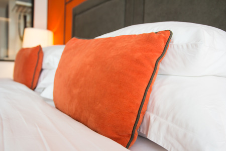 Empty modern bed in bedroomの写真素材