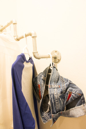 clothes hanging on bars.interior design conceptの写真素材