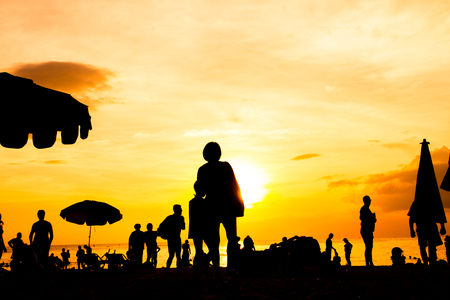 silhouette of travel on beach.の写真素材