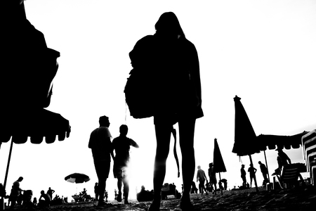 silhouette of travel on beach.の写真素材