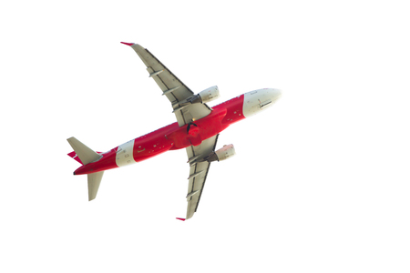 airplane flying on white backgroundの写真素材