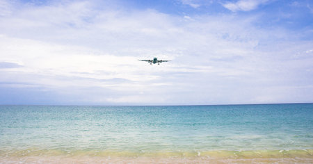 Airplane landing to airportの写真素材