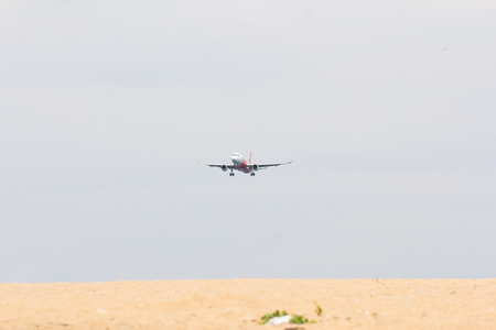 Airplane landing to airportの写真素材