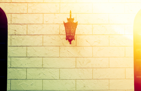 Vintage lamp on the wallの写真素材