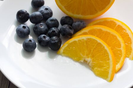 Fruit on white plateの写真素材