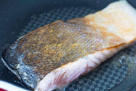 Grilled salmon fillets in the pan.の写真素材