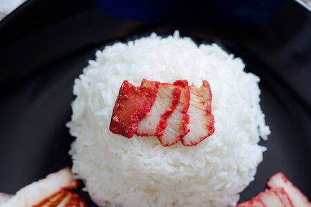 Red pork with riceの写真素材