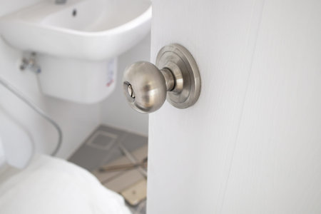 Open the door. Door with chrome metal handleの写真素材