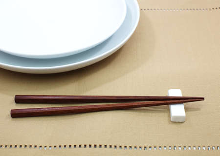 Chopsticks in asian set tableの写真素材