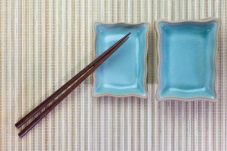 Chopsticks and Asian table settingの写真素材