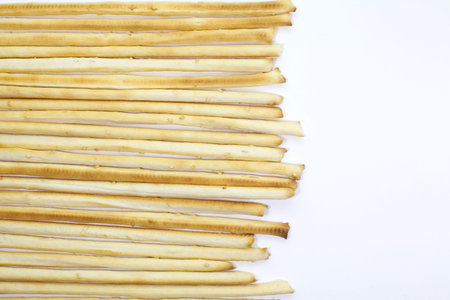 bread sticks on a white background 