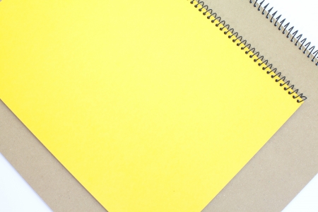 yellow note book isolate on white background の写真素材