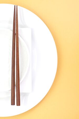 Chopsticks and Asian table setting の写真素材