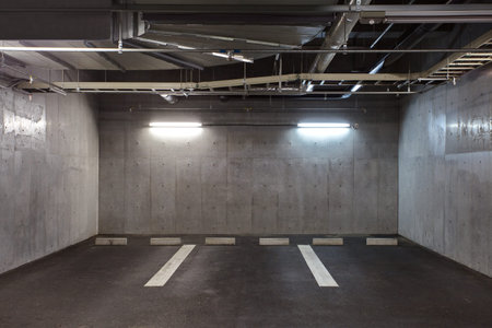 Parking garage underground interior, neon lights in darkのeditorial素材