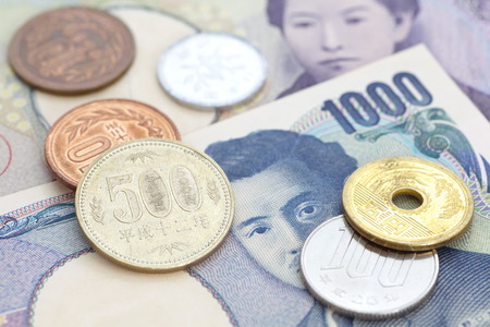 close - up japanese currency yen bank note and coinの写真素材