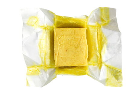 Bouillon soup cube for cooking on white backgroundの写真素材