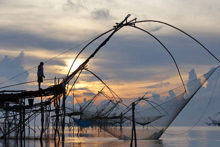 landscape of square dip net at sunrise time from phattalung prefecture , thailandの写真素材