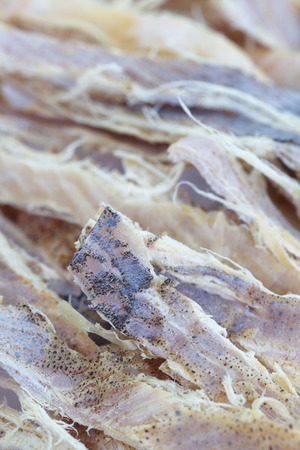 close - up delicious dried squid snack の写真素材