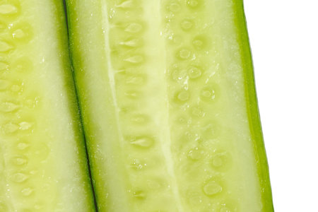 Fresh cucumber sticks on a white background の写真素材