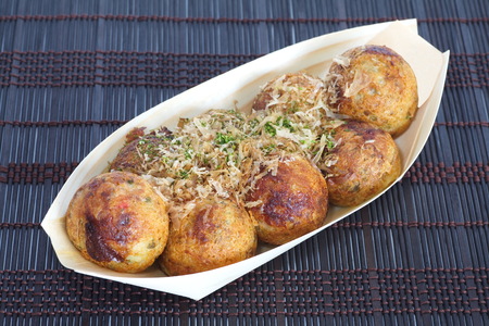 Takoyaki ,ball - shaped Japanese snack made of a wheat flour - based batterの写真素材