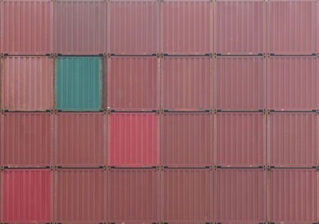 Stack of red Container cargo shipping at container dockyard