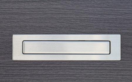 Metal post box and modern wood doorの写真素材