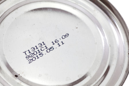 Expiry date printed on silver tin canの写真素材