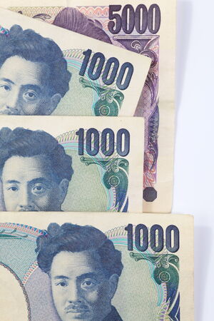 close up of japanese currency yen bank notesの写真素材