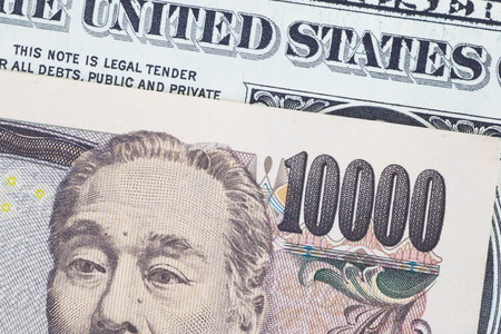 Japanese yen bank note and dollar bank noteの写真素材
