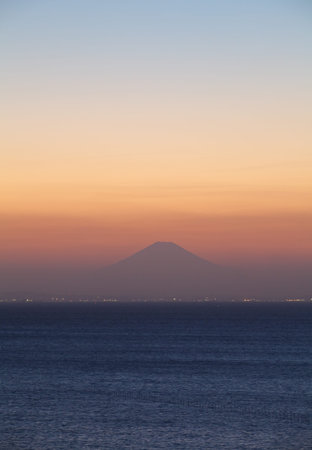 Mountain Fuji in summer season at sunset from Tokyo bayの写真素材