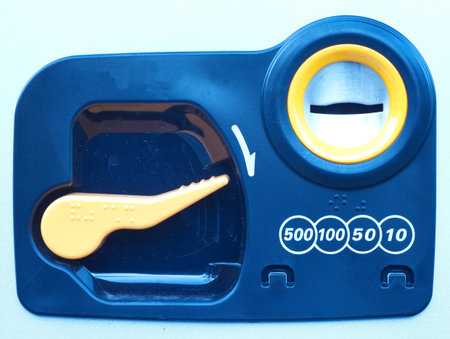 Close - up Coin insert space for vending Machine
