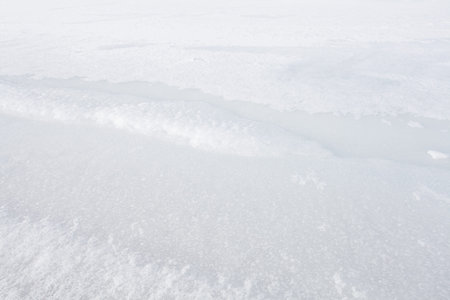 Background and texture of ice on lake in winter season