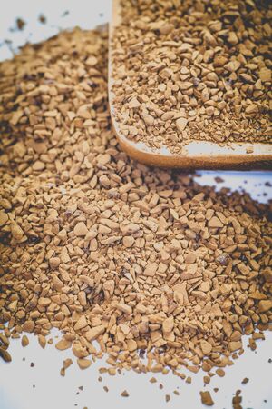 Granules of instant coffee on a white backgroundの写真素材