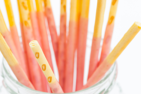 Japanese snack food biscuit stick strawburry coated in glass bottleの写真素材