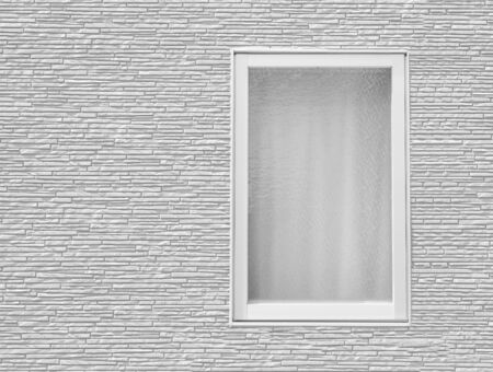 White modern window and white brick wall backgroundの写真素材