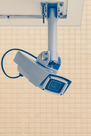 Video camera security system on the wall of the building