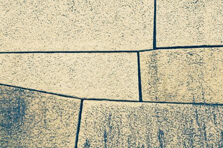 Old stone block wall background and textureの写真素材