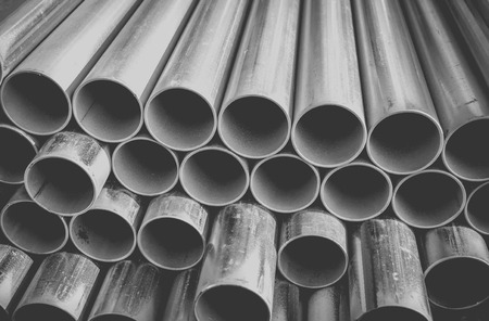 Stack of construction metal pipesの写真素材