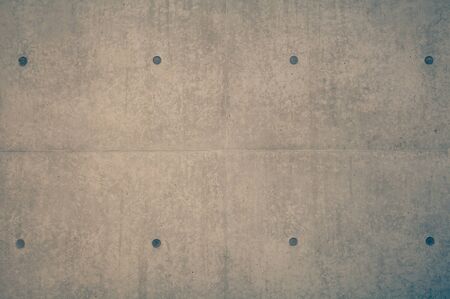 Modern concrete building wall seamless background and textureの写真素材