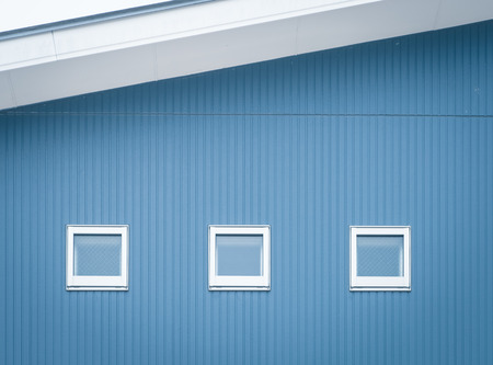 Detail of house exterior wall and window.の写真素材