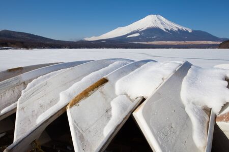 Mountain fuji and Ice lake in winter at Yamanakako lake ,Yamanashiの写真素材