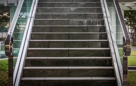 Indoor black concrete stairs in modern buildingの写真素材