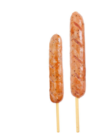 Tasty grilled sausage isolated on a white background with text spaceの写真素材