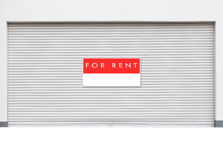 For rent sign on factory shutter doorの写真素材