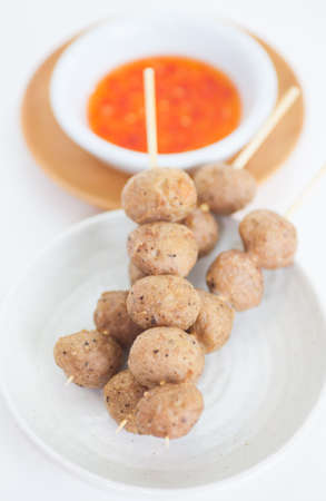 Grilled pork meat ball and sweet chili sauceの写真素材