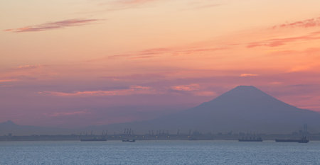 Mountain Fuji and cloud in sunset time seen from Tokyo bayの写真素材