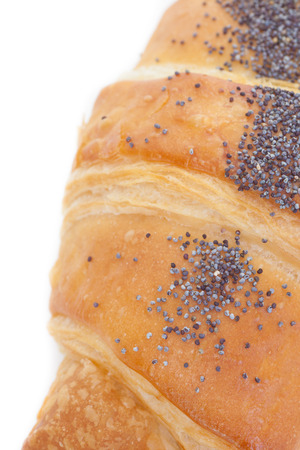 Fresh and tasty croissant over white backgroundの写真素材